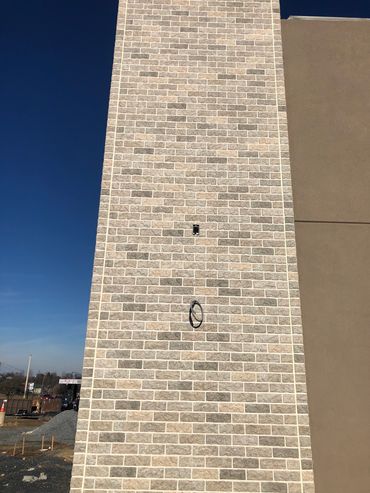 Caulking Niche facade.