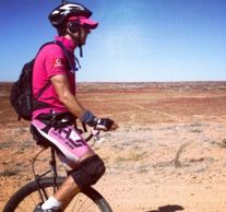 Samuel Johnson riding his 36" unicycle around Australia for 'Love Your Sister'