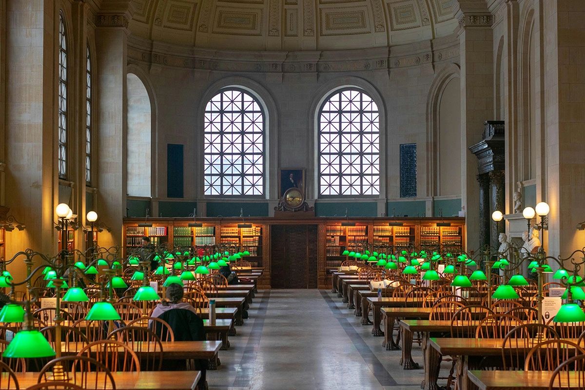 The stunning Bates Hall reading room at the Boston Public Library is one of the most iconic literary spaces in the world. With its grand arched windows, soaring ceilings, and signature green reading lamps, this historic library is a dream destination for book lovers, students, and travelers alike. Located in Copley Square, the library is free to visit and offers a breathtaking glimpse into Boston’s rich architectural and cultural heritage The stunning Bates Hall reading room at the Boston Public Library is one of the most iconic literary spaces in the world. With its grand arched windows, soaring ceilings, and signature green reading lamps, this historic library is a dream destination for book lovers, students, and travelers alike. Located in Copley Square, the library is free to visit and offers a breathtaking glimpse into Boston’s rich architectural and cultural heritage