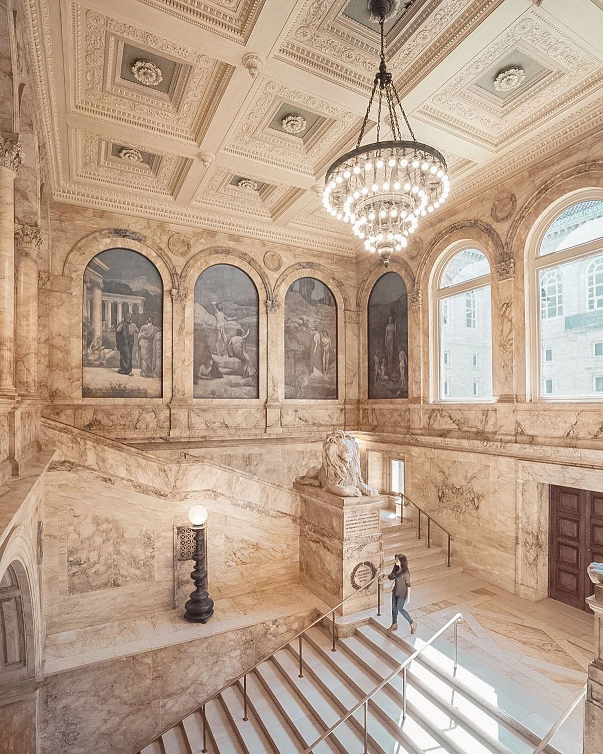 The Boston Public Library’s Grand Staircase is a masterpiece of marble, intricate carvings, and timeless elegance. Adorned with stunning murals, a majestic chandelier, and the iconic lion statues, this historic space feels like stepping into a European palace. Located in Copley Square, the library is free to visit and a must-see for architecture lovers and history enthusiasts alike. The Boston Public Library’s Grand Staircase is a masterpiece of marble, intricate carvings, and timeless elegance. Adorned with stunning murals, a majestic chandelier, and the iconic lion statues, this historic space feels like stepping into a European palace. Located in Copley Square, the library is free to visit and a must-see for architecture lovers and history enthusiasts alike.