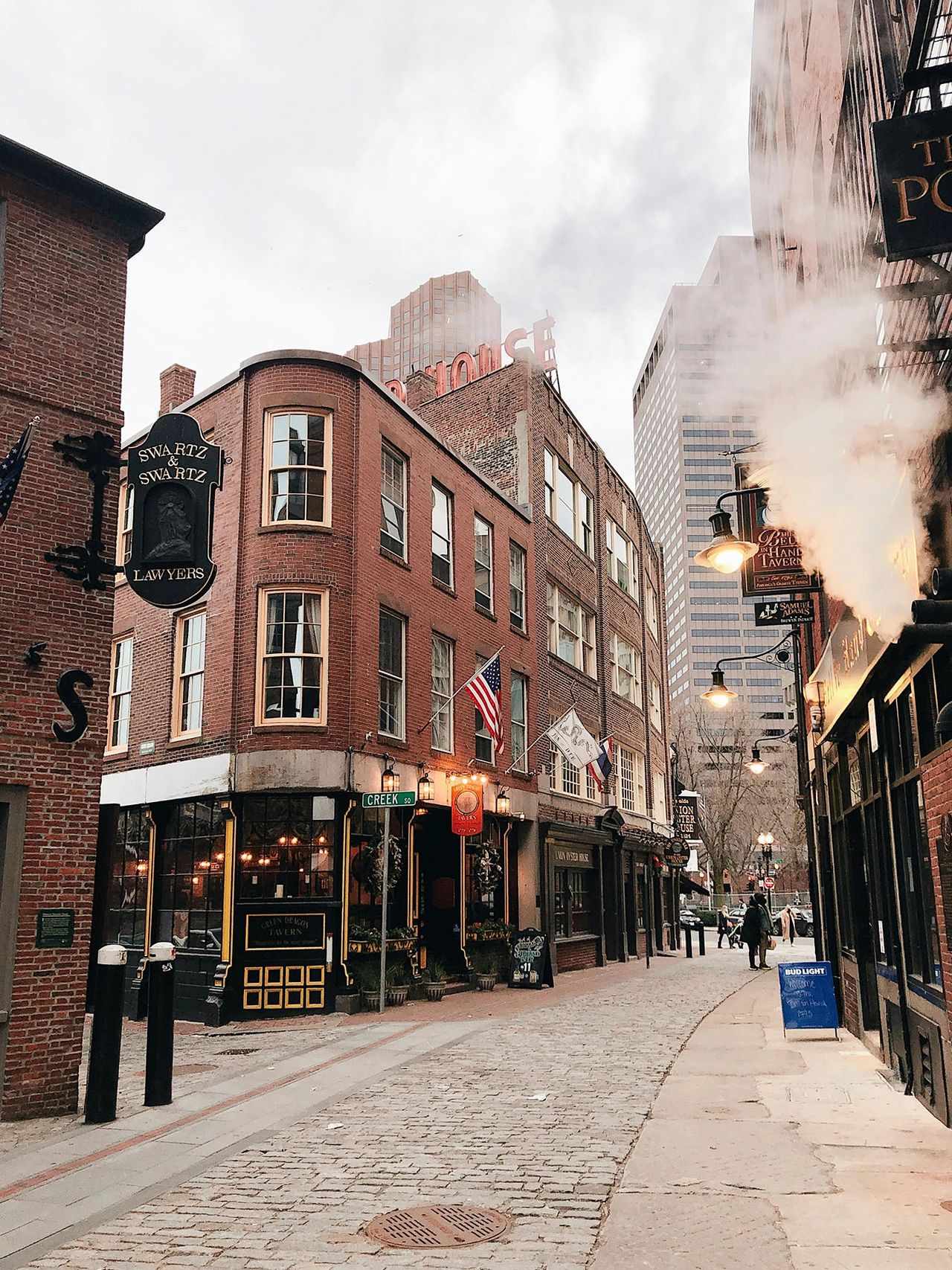 Step into the old-world charm of Boston’s North End with this atmospheric view of Hanover Street. Known for its rich history, cobblestone streets, and some of the best Italian restaurants in the city, this neighborhood offers a true taste of Europe in the heart of Boston. Whether you're exploring the Freedom Trail or stopping by for a meal at a legendary eatery, the North End is a must-visit destination for history lovers and food enthusiasts alike. Step into the old-world charm of Boston’s North End with this atmospheric view of Hanover Street. Known for its rich history, cobblestone streets, and some of the best Italian restaurants in the city, this neighborhood offers a true taste of Europe in the heart of Boston. Whether you're exploring the Freedom Trail or stopping by for a meal at a legendary eatery, the North End is a must-visit destination for history lovers and food enthusiasts alike.