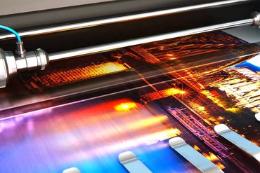 Large format digital printer producing vivid, high-resolution prints for small business marketing ma