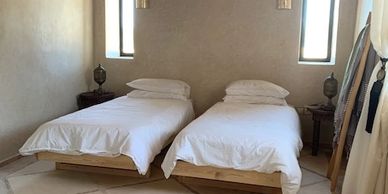 two beds in a badroom