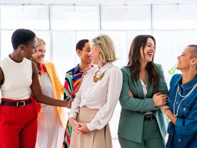 Smiling Women Connecting Professionals
