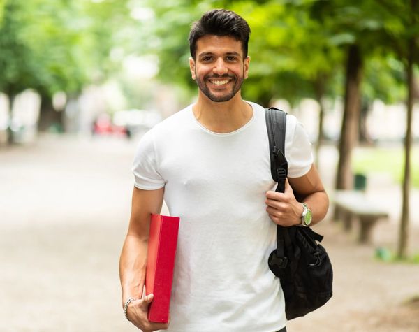 Happy Male Student after Increasing His SAT Score by over 100 Points. Walker Test Prep Review.