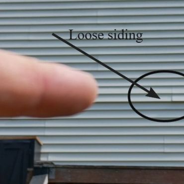Loose vinyl siding in Derry NH