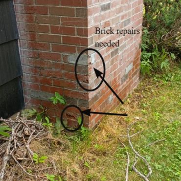 Chimney in need of brick repairs and repointing in York Maine,