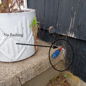 1950 concrete step system not flashed at the exterior wall connections and causing wood rot and mois
