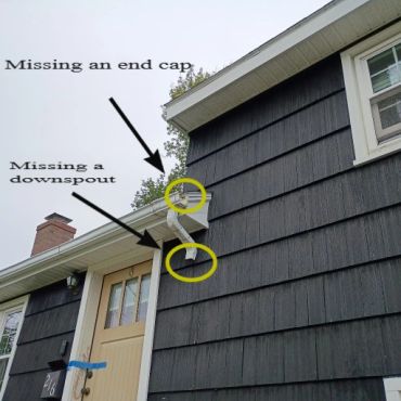 Gutter missing end cap and downspout in York Maine