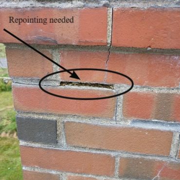 Picture of mortar missing between bricks. Chimney repair needed in York Maine.