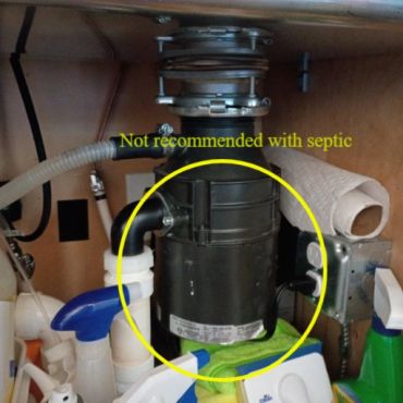 Disposal system below a kitchen sink that is at a house with a septic system, not recommended.