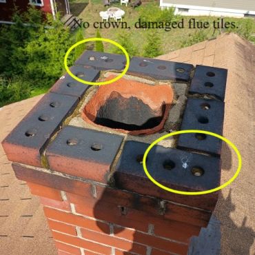 Chimney is missing a chimney crown and the top flue tile is damaged in Belmont NH