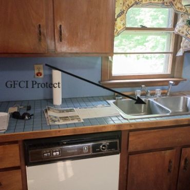 Kitchen counter receptacle not GFCI protected. Belmont NH