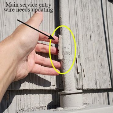 Service entry wire above the meter is showing signs of age and needs updating. Belmont NH