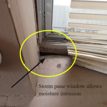 Window stool with damage from a leaky window in Belmont NH