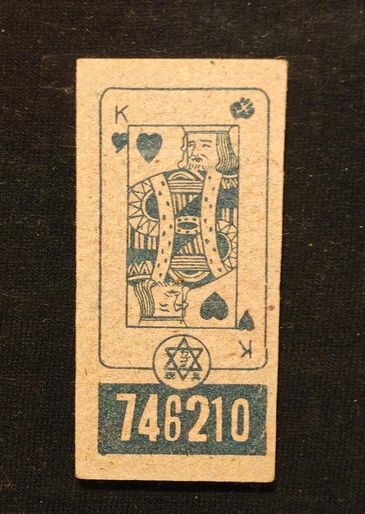 Vintage King of Hearts playing card with unique symbols and number 746210.