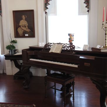 Antique piano at Orange Hall in St. Marys Georgia.