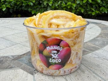 Mango Loco spiral-cut fresh mango served with signature seasonings and flavours
