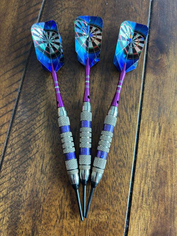 3 Darts Lined Up