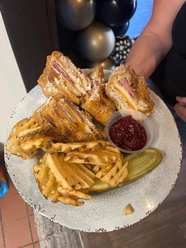 Monte Cristo: Double decker, turkey, ham, pepperjack and cheddar cheese, battered and deep fried