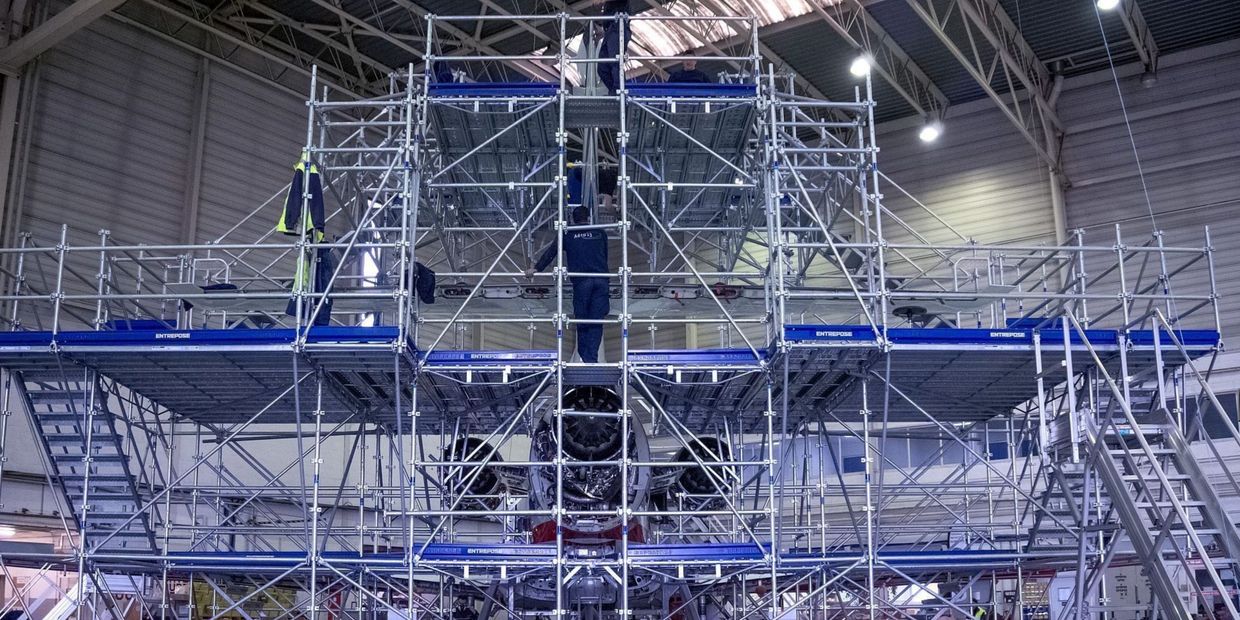 A Falcon private jet aircraft undergoing maintenance, repair, or overhaul (MRO).