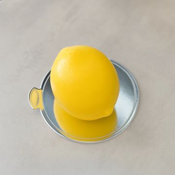 A light and refreshing lemon mousse cake with a smooth finish, filled with mascarpone cheese, white