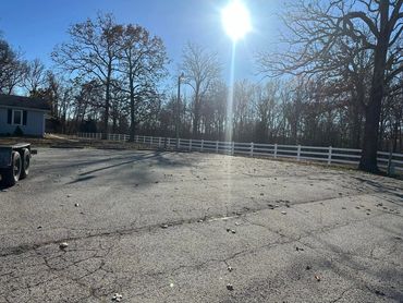 2 rail White vinyl fence installation in Pomona, Missouri Installed by Williams Fence in West Plains