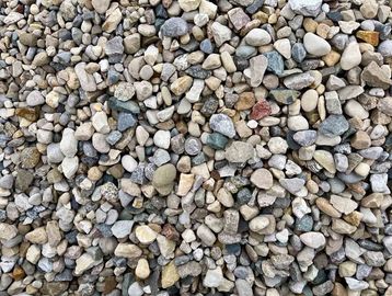 Small Decorative Washed River Rock for sale by scoop and bulk. 