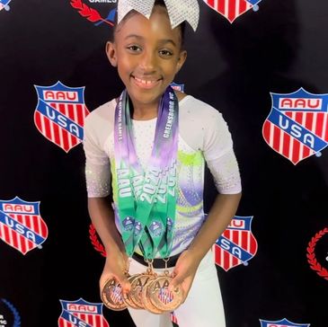 a girl wearing a medals