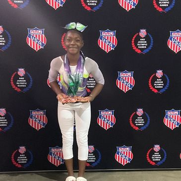 a girl wearing a medals