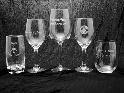 Wine glasses engraved using Sand Carving technique.