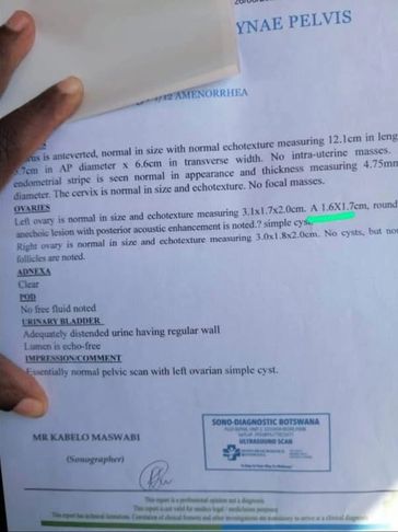 Medical ultrasound report showing normal pelvic ultrasound with ovarian cyst noted.