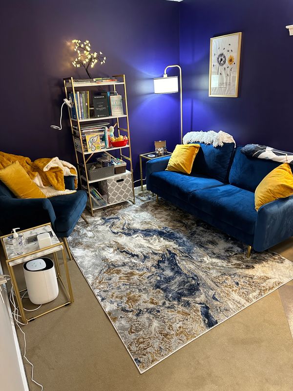 Laura Velas lcsw office couch blue door heart of therapy counseling mental health therapy
