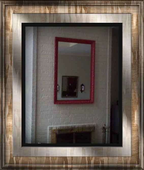 Mirror in Brick Above Fireplace
