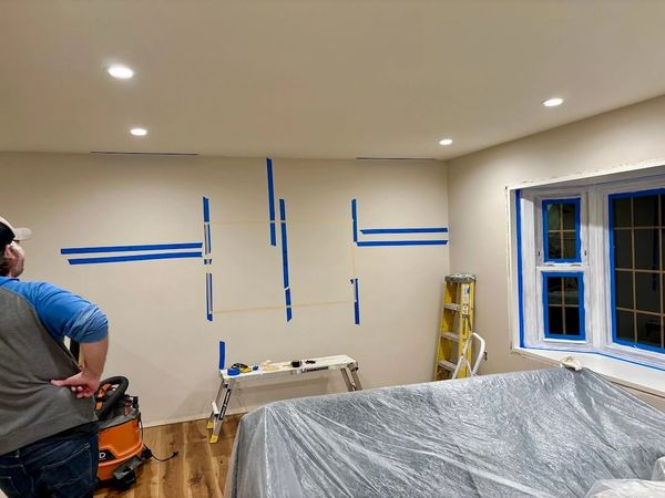 Achieving the perfect balance: Our experts consider lighting & layout for flawless TV wall mounting.