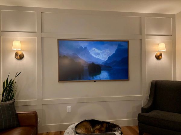 The finished product after doing the work to perfectly center the tv with the room and lighting.