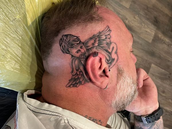 Head banger tattoo