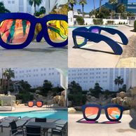 These sunglasses are 4’ Tall and 10’ Wide with functioning 10’ Long arms.