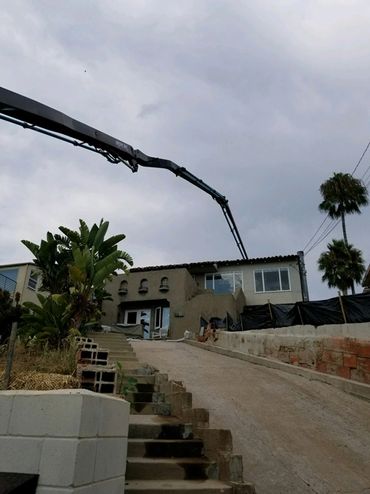 Concrete pumping over an entire house in San Diego