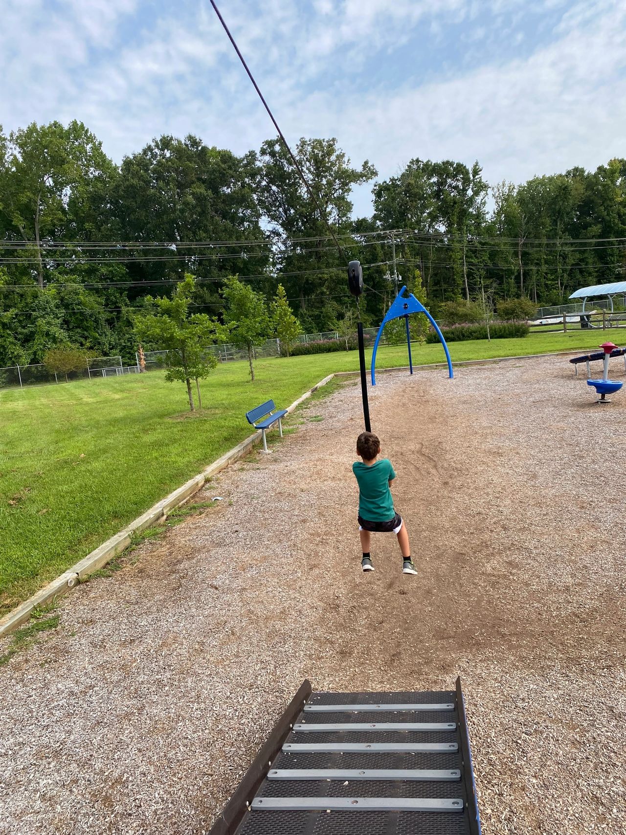 Little boy on zip line Little boy on zip line