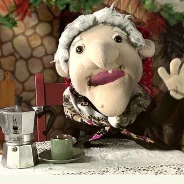 La Befana puppet promoting Music for Migrants