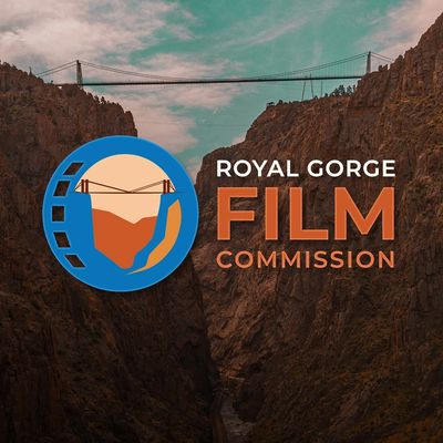 Logo of Royal Gorge Film Commission with a suspension bridge over a canyon.