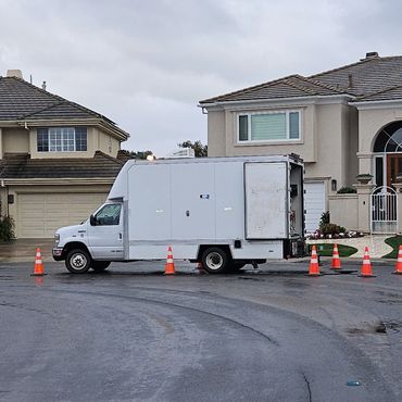 CCTV pipeline inspection van in a culdesac.