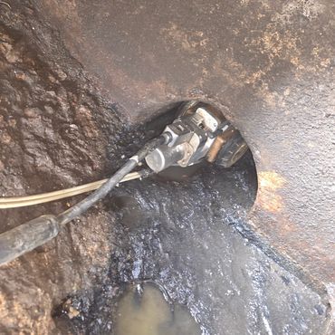 Pipeline inspection robot going inside a storm drain pipe.