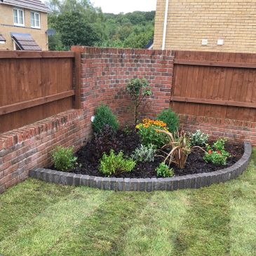 Planted up small rockery and new lawn laid