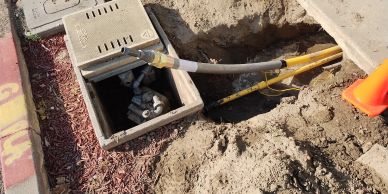 Gas meter with expose 2" poly gas line, about to be connected to gas meter