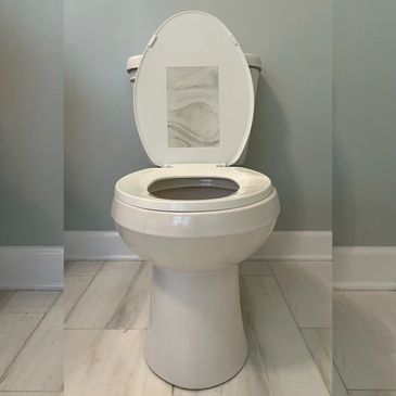 The original Butt Looker toilet lid mirror.