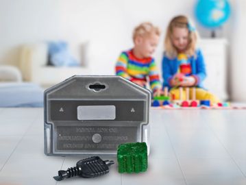 A Lockable Mouse Bait Station with a key and bait block.