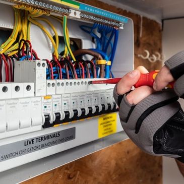Ottawa electrician performing home rewiring and breaker panel service for Ring Electric