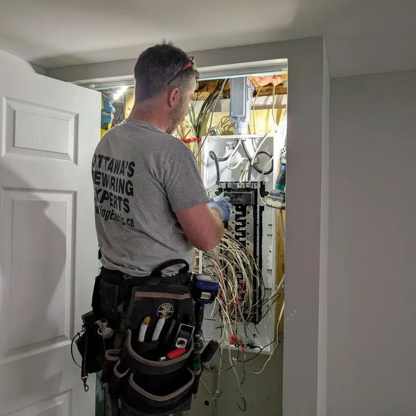 Licensed Ottawa electrician from Ring Electric upgrading home electrical panel